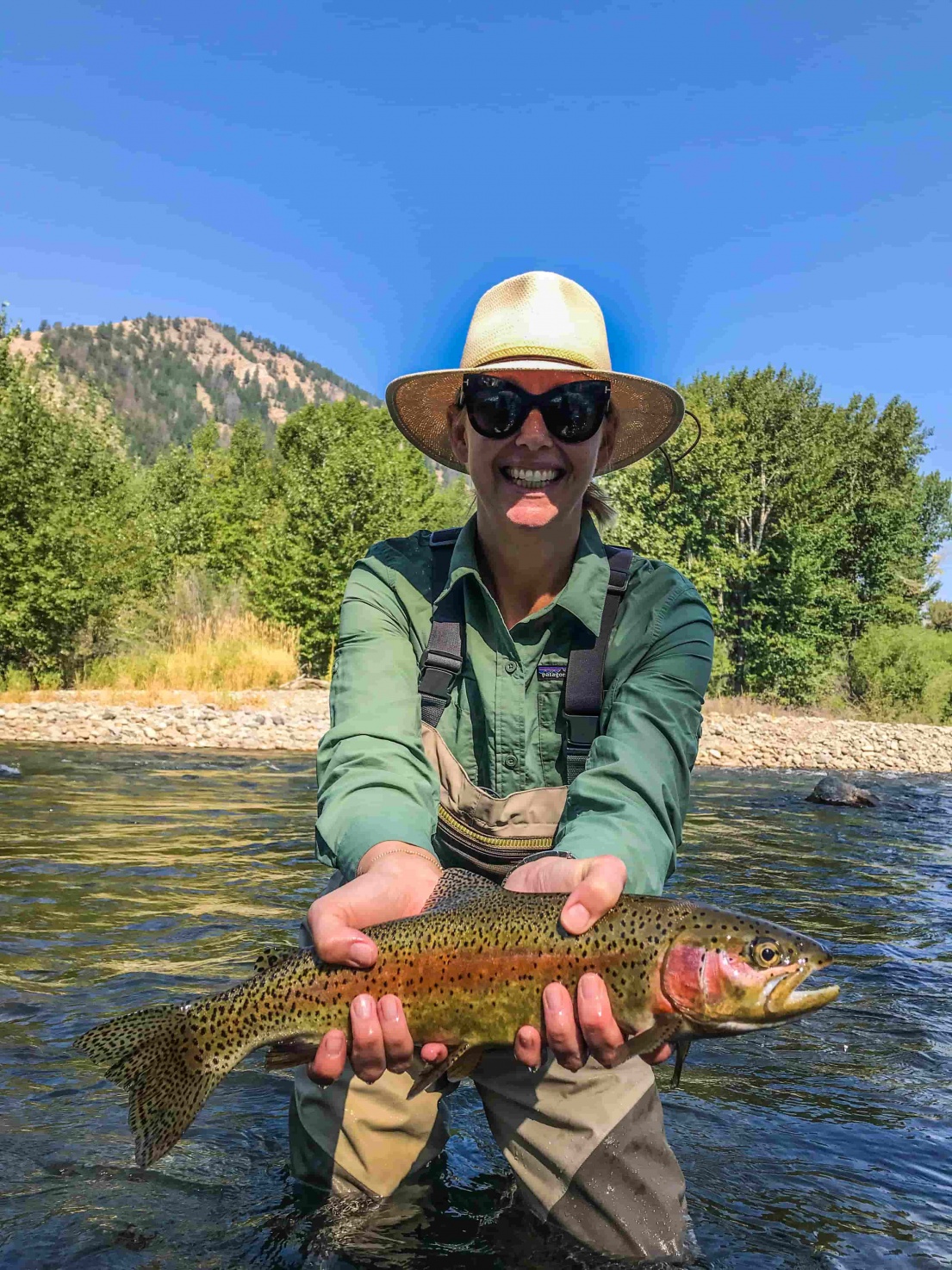 Woman with beautiful fish on the Big Wood River